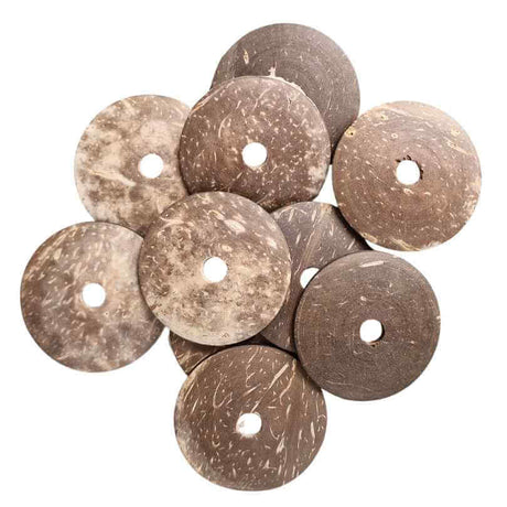 Close up of Coconut Shell Discs 10pk showing the natural coconut shell texture and pre drilled holes