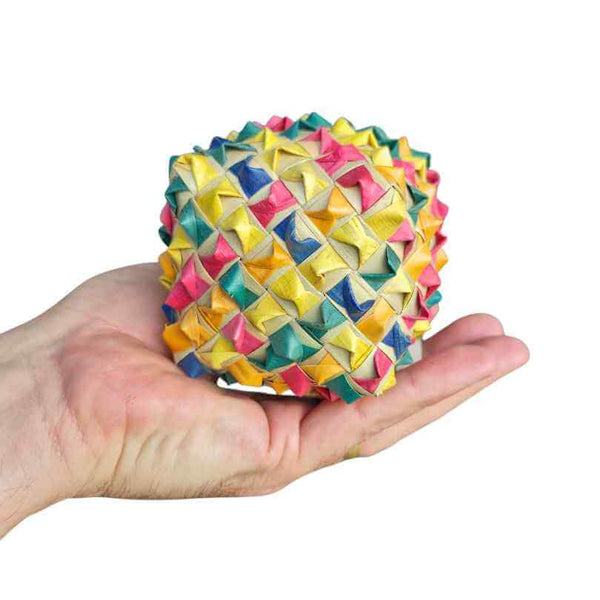 Feathered Friends Large Foraging Tumbler Cube held in hand to show size