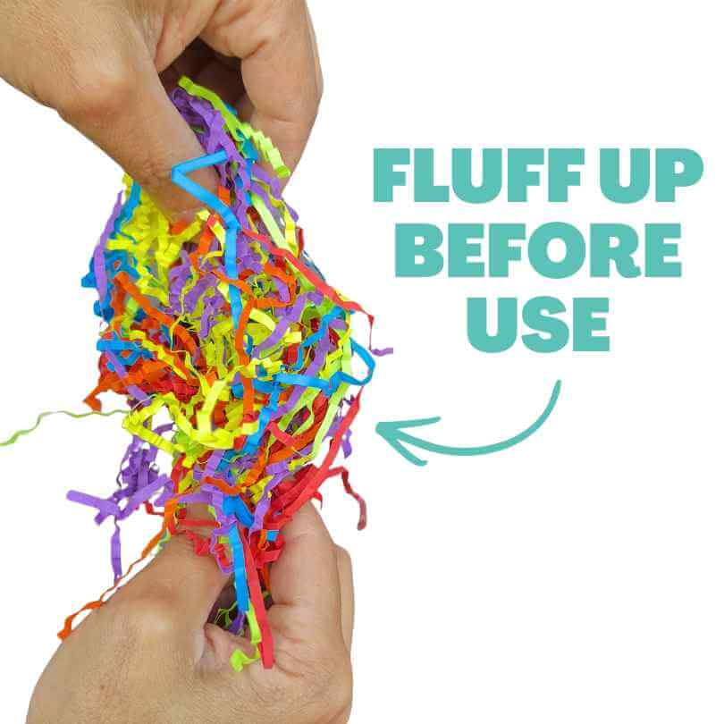 Close up of Feathered Friends shredded paper refill for foraging trays and DIY bird toys