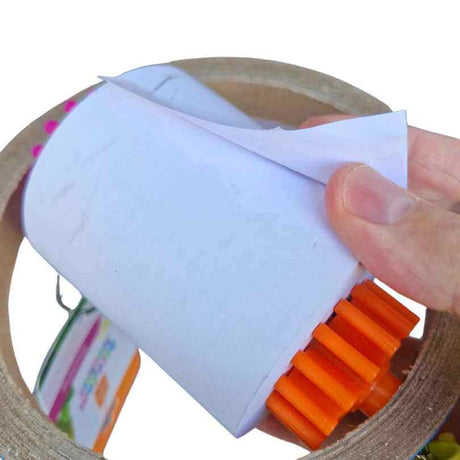 Side view of the Receipt Shredder Ring showing the layered paper rolls