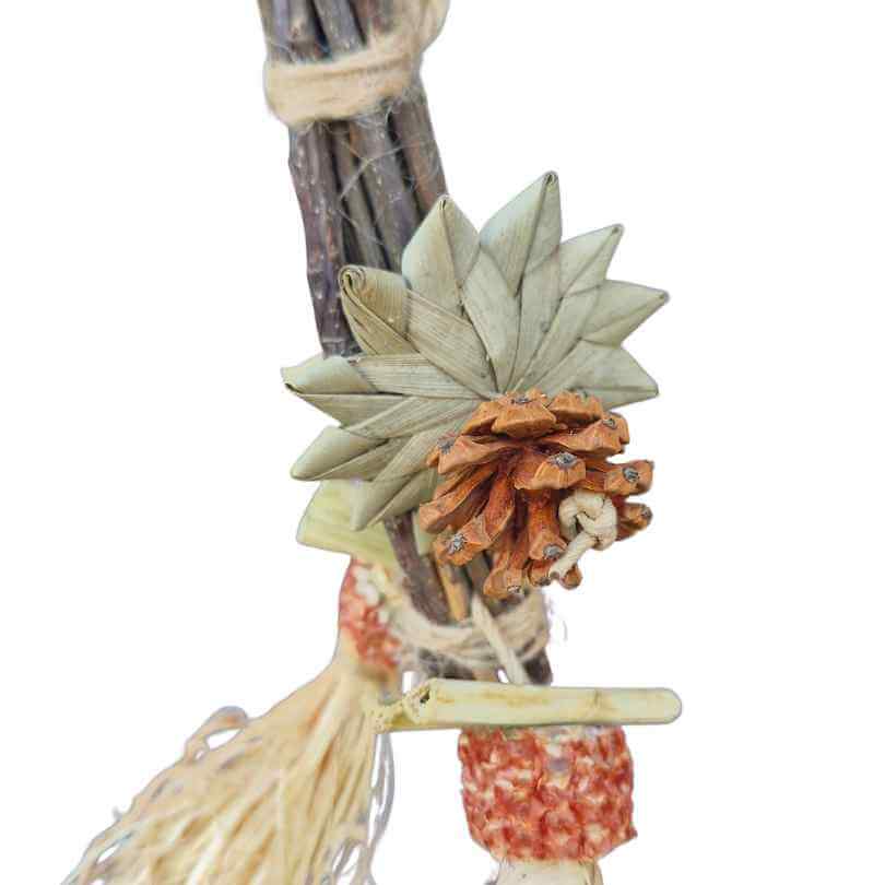 Close-up of the raffia and corn cob dangles on the Beak Joy Tiny Chew Drop small bird chew toy
