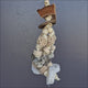 Pumice and Loofa Dangle bird toy for chewing and shredding