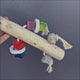 Java Pumice Play Perch – Java wood perch with pumice stones, coloured blocks and loofah, for medium to large birds