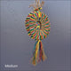 Piñata Foraging Wheel filled with colourful shreddable pieces for parrots to chew, pull apart and explore.