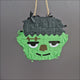 Zombie Halloween Parrot Pinata shown from different angles with a hole for adding treats