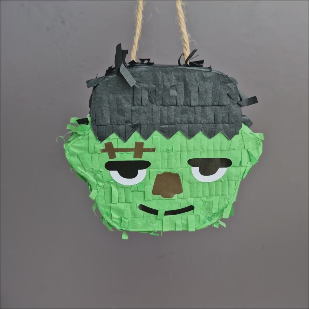 Zombie Halloween Parrot Pinata shown from different angles with a hole for adding treats