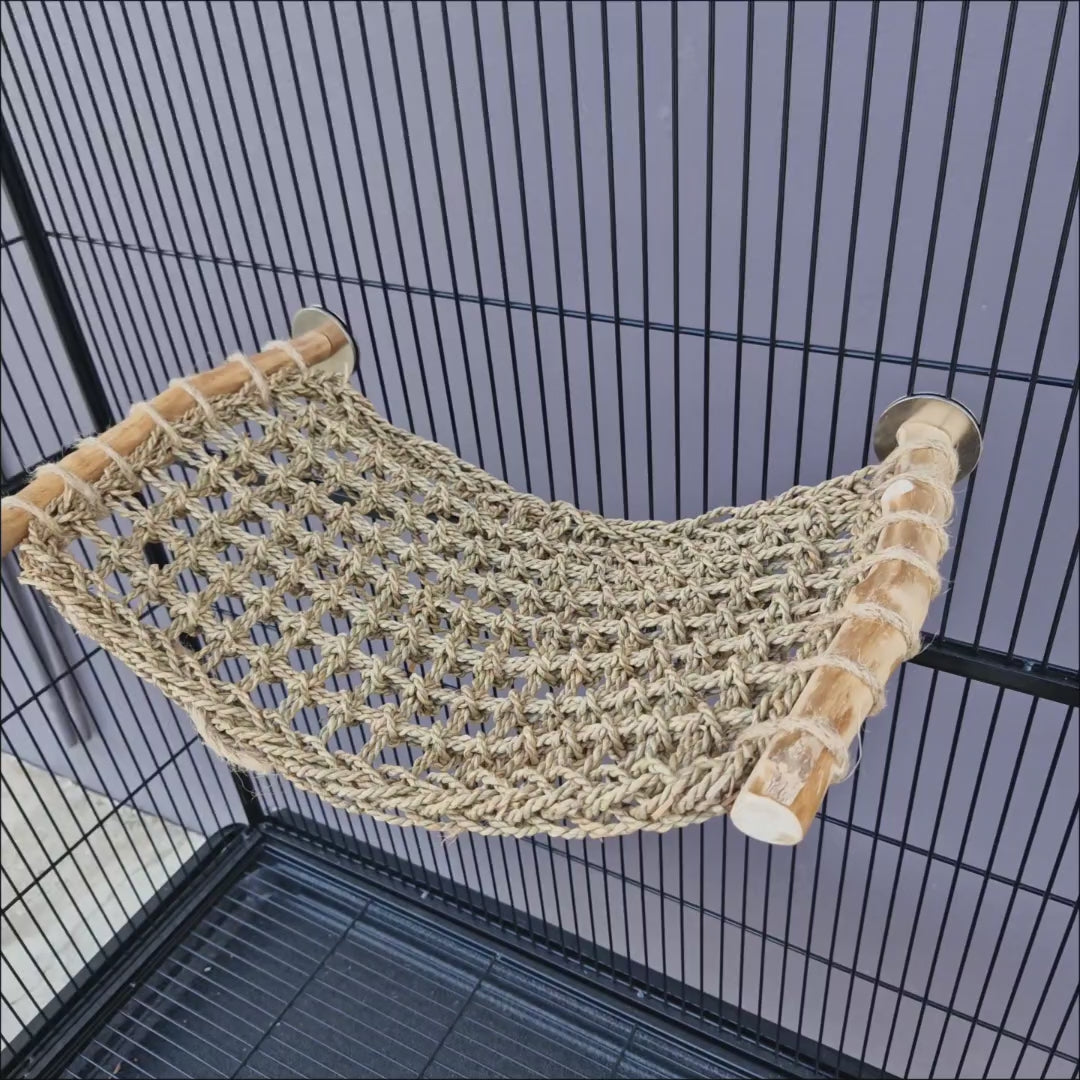 Video showing the Java Trampoline, its java wood frame, woven seagrass platform and wing nut cage fitting