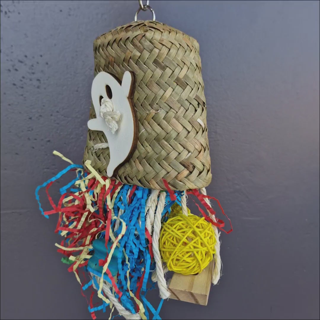 Halloween Ghost Shredder – woven basket shredder toy with colourful paper, wooden ghost, rope and chew pieces for small to medium parrots
