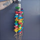 Big Cascade – chunky pinewood block chew toy on chain with leather tassels, 50cm, for medium to large parrots