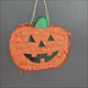 Pumpkin Halloween Parrot Pinata shown from different angles with a hole for adding treats