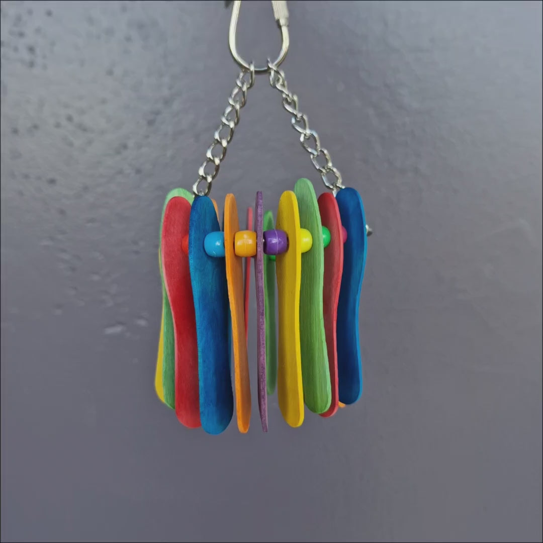 Mini Popsicle Ring shown from different angles with colourful wooden sticks and beads