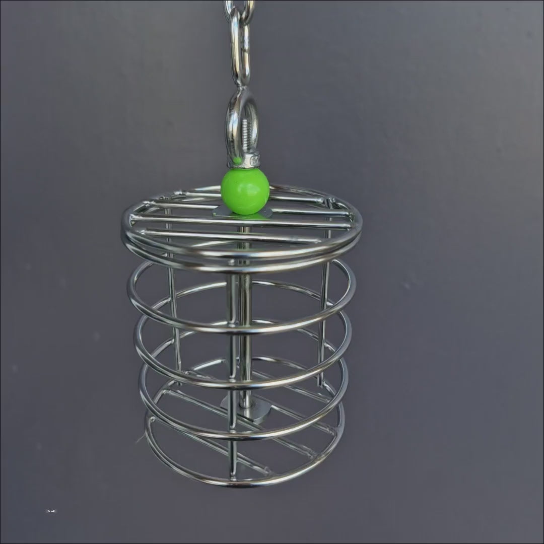 Round Foraging Baffle bird toy filled with treats for foraging